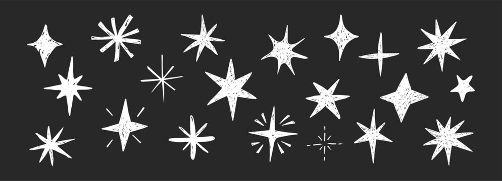 Doodle hand drawn stars crayon sparkles set on blackboard. Scribble texture freehand childlike chalk or pencil drawing sketch. Celestial elements with rough edge 
