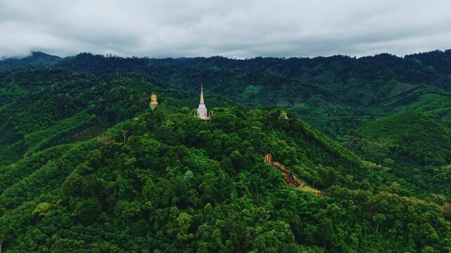 Aerial view Wat Bang Riang temple in Khao Lan mountains, statue Kwan Yin Chinese Goddess in Phang Nga Province, Thailand.