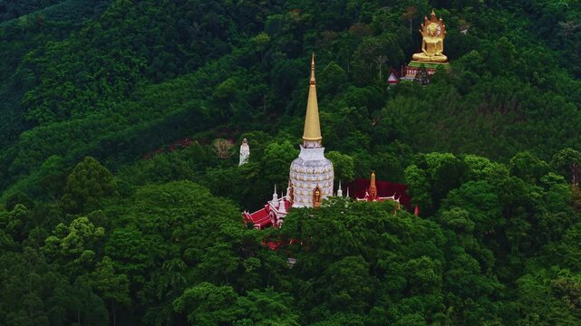 Wat Bang Riang temple in Khao Lan mountains of Phang Nga Province, Thailand aerial view. Compassion statue Kwan Yin Chinese Goddess.