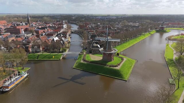 Aerial view of Dokkum canals and windmill Friesland Netherlands
