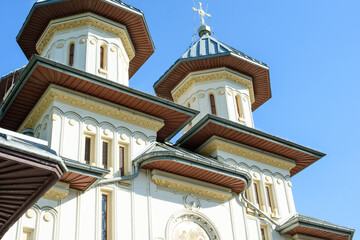 Church Exterior with Cross and Twin Towers © Visual Voyager