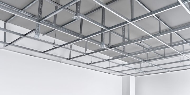 Modern suspended ceiling grid system with white panels and metal framing