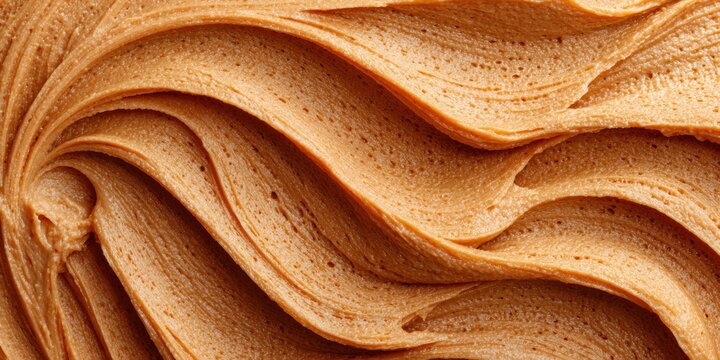 Creamy peanut butter swirl texture close-up, a delicious spread for breakfast and snacks