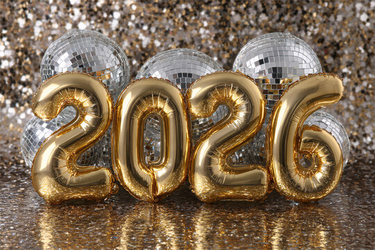 Gold 2026 New Year Balloon Numbers with Disco Balls n Glittery Party Backgroun