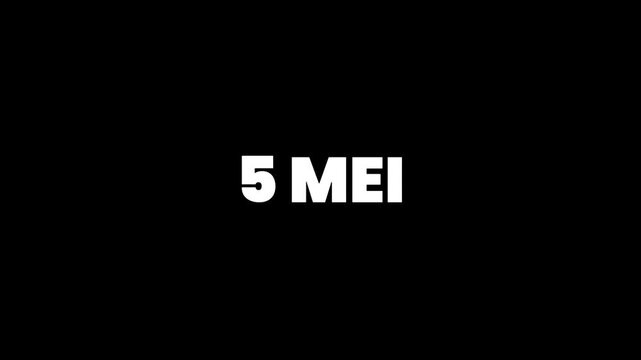 A close-up view of a date, 5 MEIs, on a black and white background.