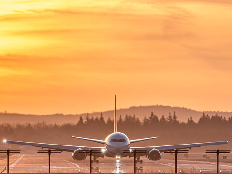 An Airbus aircraft takes off from Ramstein Air Base, accelerating along the runway before lifting into the sky. The scene highlights aviation power, military logistics, and modern air transport operat