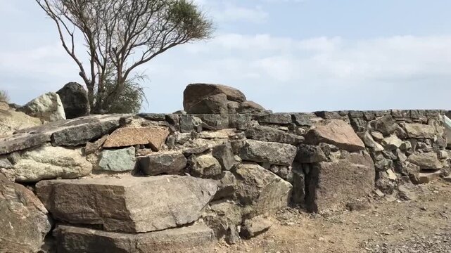 Walk along the rocky path at the ancient fort on the hill