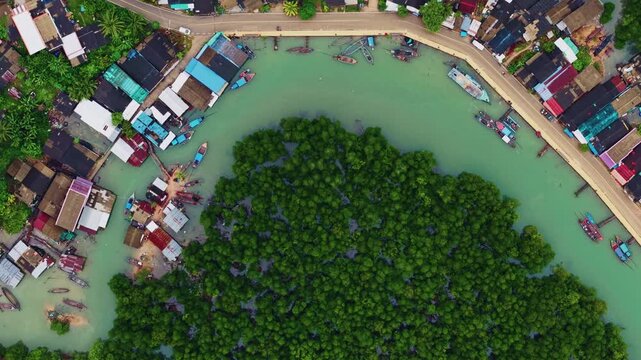 Aerial view Landscape of fish village in Phang Nga bay with fog. Hong green lush tropical island Thailand.