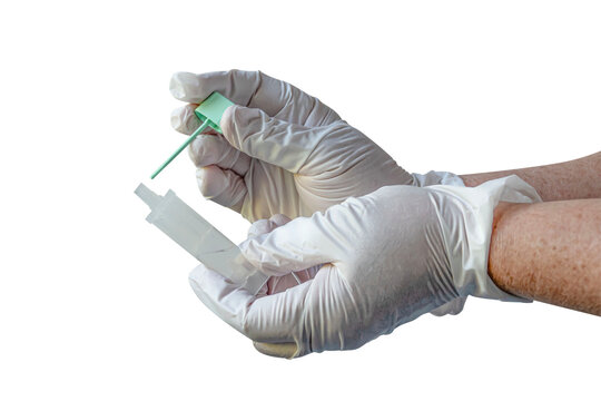 Hands set up a medical test kit