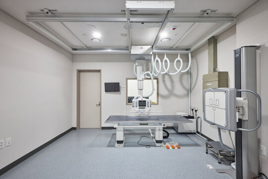 Modern x ray or fluoroscopy procedure room in hospital interior