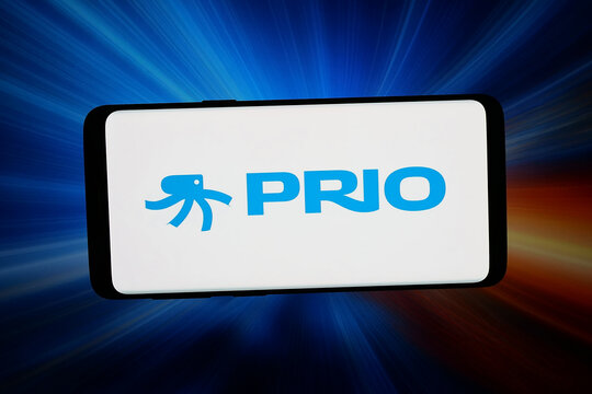 Stuttgart, Germany - 04-02-2026: In this photo illustration, the logo of Brazilian petroleum company PRIO S.A. is displayed on a smartphone in front of abstract background on computer screen.
