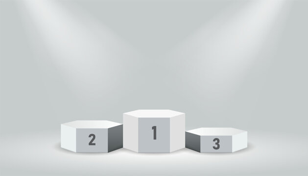Hexagonal three tier winners podium with numbered platforms illuminated by overhead spotlights on a light gray background, symbolizing ranking, achievement, and competition results