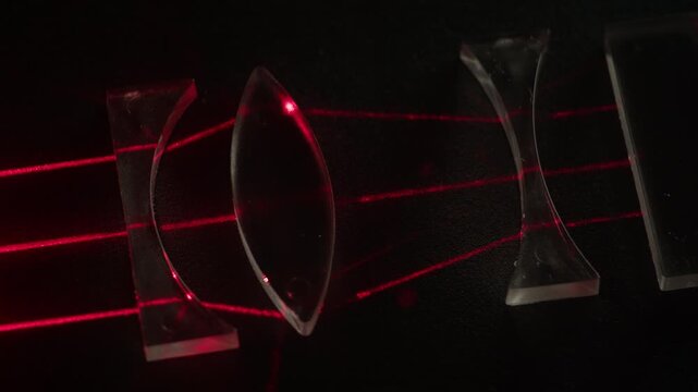 Red laser light passing through lens glass