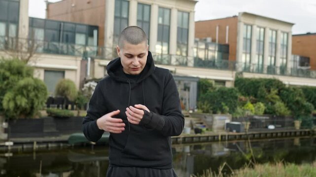 Young man with carpal tunnel complaining of pain due to working