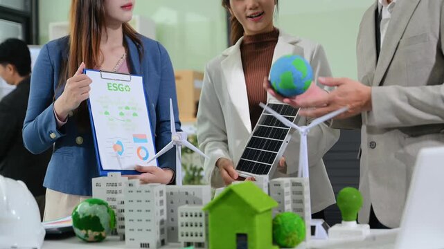 Business team working virtual modern smartphone to reduce CO2 emissions carbon footprint climate change to limit global warming.