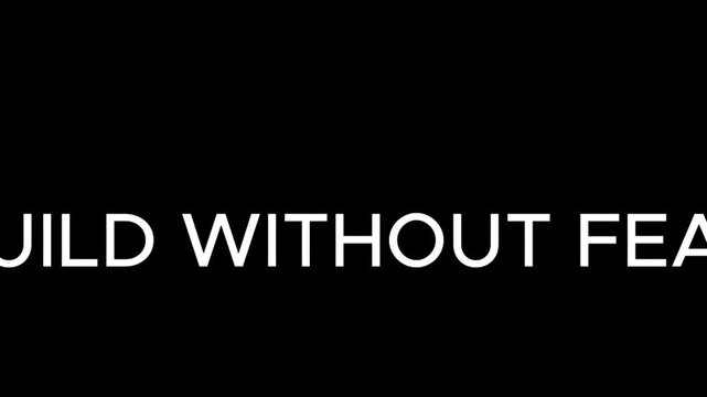 Typography displaying the words build without fear stands against a dark and minimal black background.