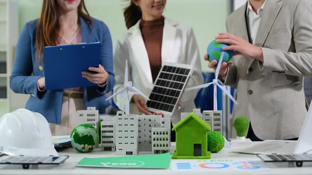 Business team working virtual modern smartphone to reduce CO2 emissions carbon footprint climate change to limit global warming.