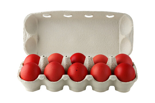 Cardboard carton box with fresh painted in red chicken eggs isolated on white. Packaging products for market. Happy Easter eggs.