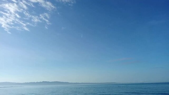 sea and sky, island, mountains. time lapse