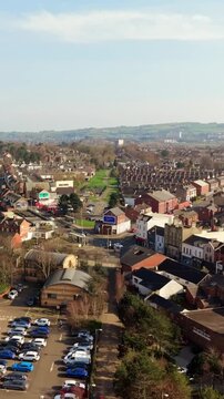 Travelling 60FPS vertical social ratio aerial GV of the Newtownards Road area in East Belfast, Northern Ireland in the UK. Produced in 1080x1920 with Rec709 color.