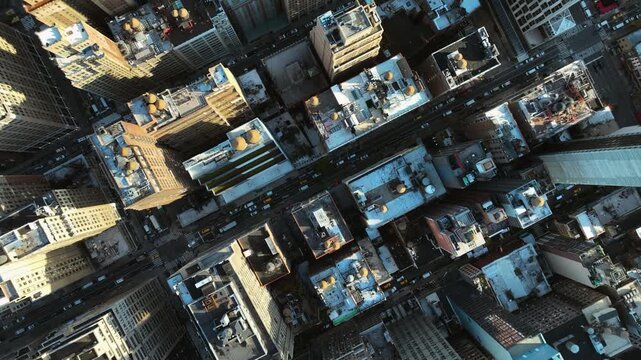 Slow cinematic overhead drone glide over Midtown, sunny day in New York city