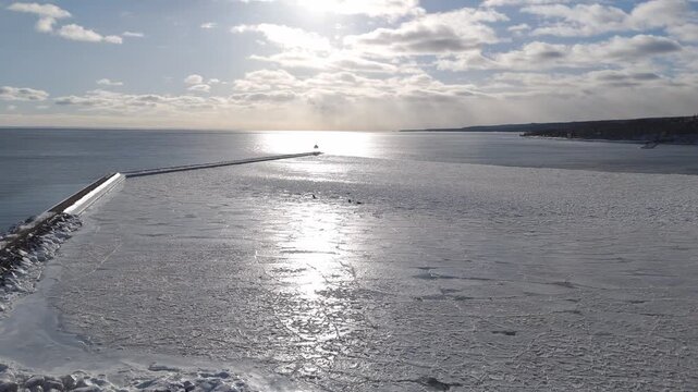 Beautiful afternoon during a warm sunset over frozen surface in two Harbors, Minnesota 6