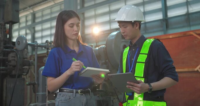 Entrepreneur explains custom DIY workpiece requirements to an engineer, reviewing parts, design options and prototype specifications in a workshop during development planning.
