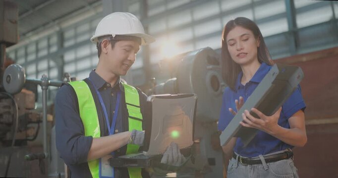Entrepreneur explains custom DIY workpiece requirements to an engineer, reviewing parts, design options and prototype specifications in a workshop during development planning.
