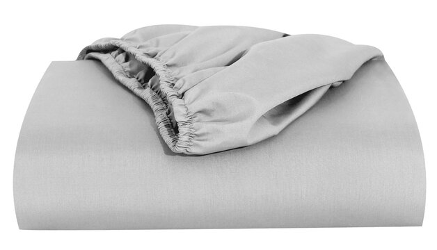 White bedsheet folded cover with elastic band fitted sheet, White fitted sheet elasticized on a white flat sheet, Bed corner with white fitted sheet