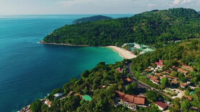 Aerial view of Karon beach and coastal scenery on Phuket island, Thailand.