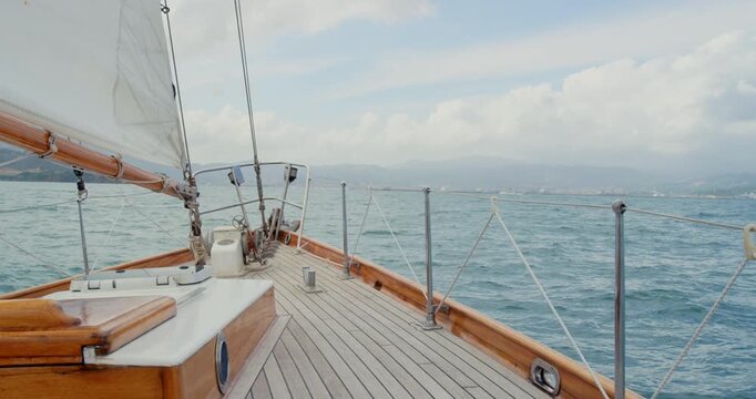 Travel, sailing and holiday with yacht outdoor for tropical getaway, summer vacation and journey. Transportation, luxury cruise and adventure with boat in nature for seaside, ocean and paradise