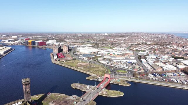 4K drone footage showing Birkenhead Dock Merseyside with dockside landscape features under clear daylight.