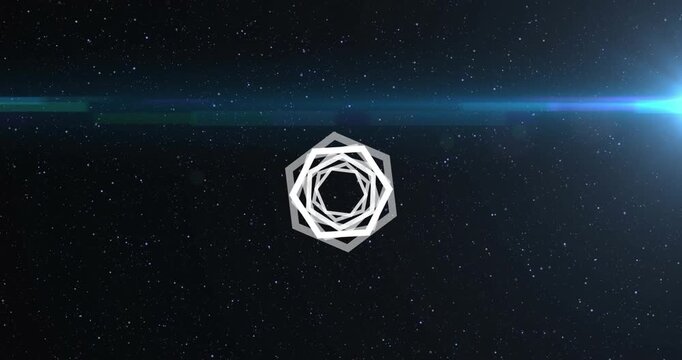 Animation of abstract hexagonal shape spinning over blue light spot against black background