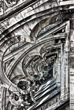 Black and white details of Milan Cathedral s Gothic ornaments aligned in precise geometric patterns across the facade