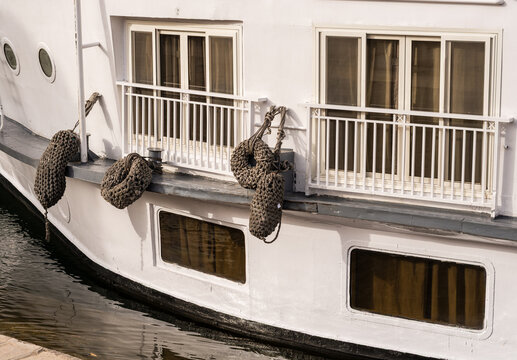 Woven rope fenders on side of a river cruise ship on the Nile Aswan Egypt