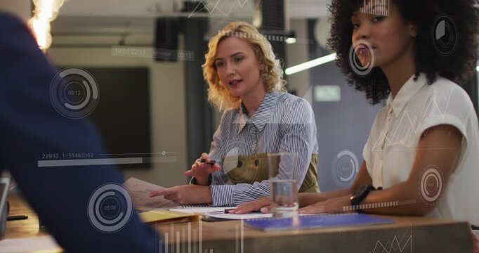 Animation of graphs, loading circles and bars over diverse coworkers sharing ideas in office