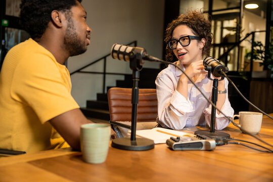 Creative team recording podcast and sharing stories