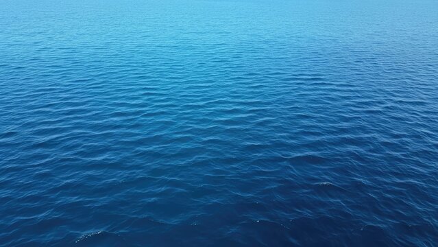 A serene and peaceful ocean scene with gentle waves and blue water