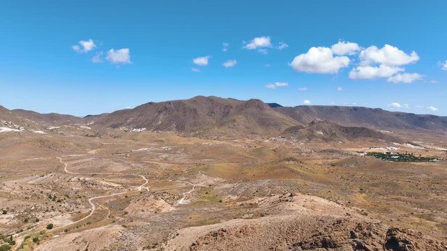 Flight over Cabo de Gata Nijar National Park's rolling arid countryside Spain
