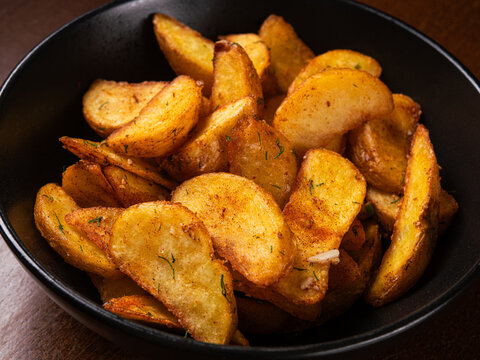 Golden roasted potato wedges with spices
