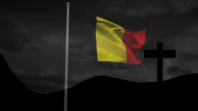 Waving Belgian flag on pole with dark cloudy sky and cross silhouette