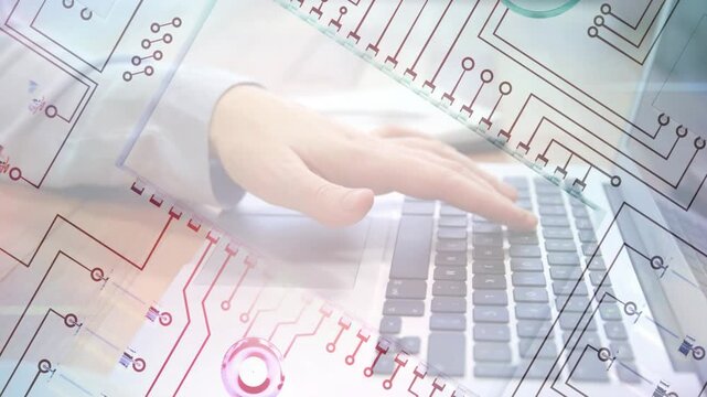 Right hand hovering over laptop keys starting typing for tech data entry, circuit overlay syncing
