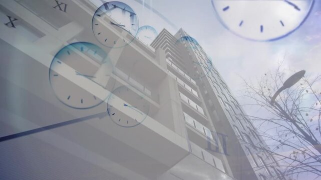 Showing tall building at street clock faces emerging showing time with bare branches and streetlamp