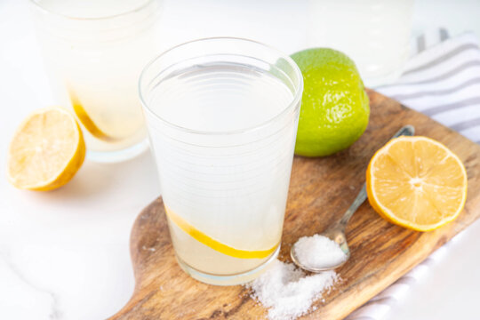 Healthy homemade Electrolyte Drink made with salt, sugar, citrus fruit (lemon and lime) juice. Sport isotonic beverage for good hydration