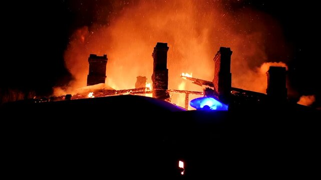 The house is on fire. A scary video of a burning dwelling.