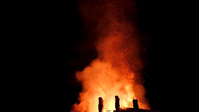 The house is on fire. A scary video of a burning dwelling.