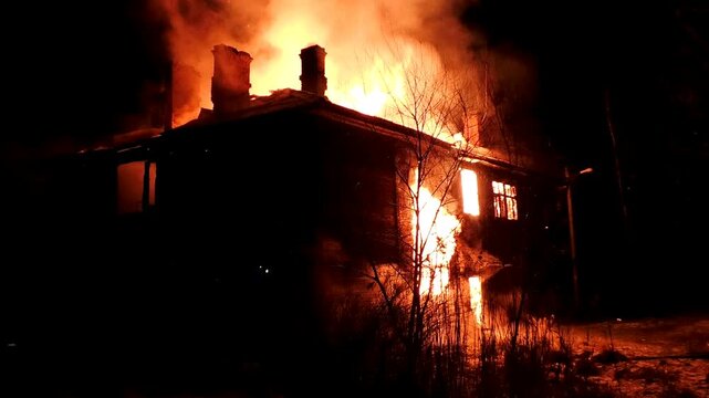 The house is on fire. A scary video of a burning dwelling.