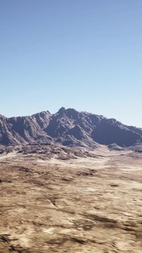 sunbaked open plain beneath clear sky, ideal site assessment for renewable energy development, photovoltaic planning and climate resilience projects