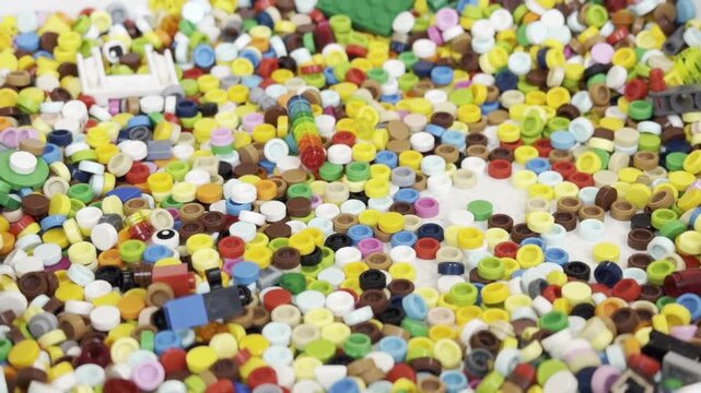Colorful pile of small round plastic beads