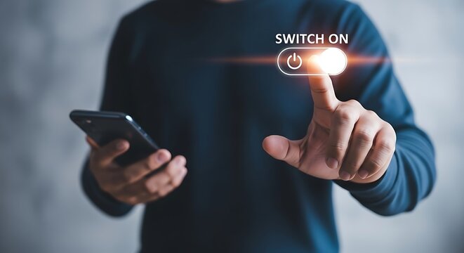 A person in a blue shirt interacting with a smartphone and a virtual switch on button
